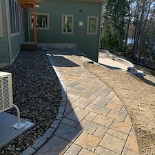 Granite-and-Paver-Hardscape-Design-with-Retaining-and-Sitting-Walls 0